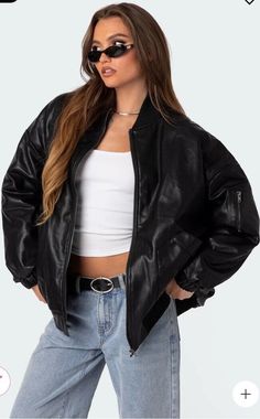 Make a bold statement with this Edikted faux leather oversized bomber jacket in black. The jacket features a zip closure, long sleeves, and a comfortable oversized fit. The outer shell material is made of high-quality faux leather, ensuring a stylish and durable look. This jacket is perfect for any occasion and can be hand washed easily to maintain its quality. The black color and bomber jacket style make it a versatile addition to any wardrobe. It is available in size large and is designed for Hailey Bieber Jacket Outfit, Outfits With Black Jacket, Cool Leather Jackets, Leather Jacket Over Dress, Winter Leather Jacket Outfit, Black Jacket Outfits, Black Jacket Outfit Women, Nz Outfits, Fbi Jacket