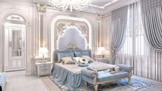 an ornate bedroom with white walls and blue bedding, chandelier and curtains