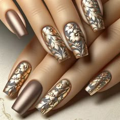 14+ Spring Aesthetic Nails - Gold Foil Nail Design Art For Spring March April May - This gorgeous nail design combines the elegance of gold foil with a pop of pastel colors, making it perfect for spring. The gold foil adds a touch of glamour and sophistication to the overall look, while the pastel colors give it a fun and playful vibe.

To achieve this look, start by painting your nails with a light pink or lavender base color. Once that has dried, use a small brush or toothpick to carefully apply strips of gold foil onto each nail. You can also use gold nail polish instead if you prefer.

Next, using different shades of pastel nail polish (such as mint green, baby blue, and pale yellow), create small dots or flowers on top of the gold foil accents. This will add an extra pop of color and Gold And Silver, Foil, Manicure, Nails, Flowers, Silver, Gold, Art