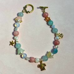 8 And A Half Inches In Length. Bead And Charm Bracelet, European Beads Bracelet, Ocean Charm Bracelet, Beach Inspired Jewelry, Ocean Themed Gifts, Ocean Themed Bracelets, Bracelet Inspo Beads, Jewelry Making Aesthetic, Beaded Bracelets Aesthetic