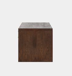 a wooden box with a metal top on a white background, it is made out of wood and concrete