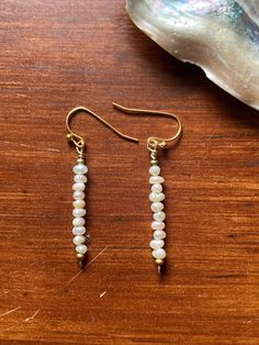 My best seller! Pearl and gold plated wire for a new take on the classic dangly pearl earring. Earring Inspo, Pearl Cluster Earrings, Coral Ring, Pearl Cluster, Pearl Earring, Eye Earrings, Cluster Earrings, Jewelry Inspo, Best Seller