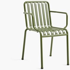 a green plastic chair on a white background