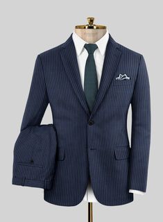 Sprinkle the stylish elegance with our Napolean Koro Wool Suit, which embraces the boldness of sartorial ambitions. Appoint a classy sophistication with our suit, crafted from a wool blend fabric that outlines a smooth, feathery texture with delicate accents and a stripes pattern over a blue tint that highlights vibrant character. Balance an exquisite taste with a sublimely tailored blue suit that captures a sense of luxury while ensuring ideal relaxation to pursue exhilarating occasions and cru Tailored Wool Suit For Office, Business Suit Sets With Pressed Crease, Wool Suit With Suit Collar For Office, Wool Suits With Suit Collar For Office, Slim Fit Wool Suit For Office, Wool Suits With Notch Lapel, Fitted Wool Suit For Office, Fitted Wool Suits For Office, Fitted Wool Three-piece Suit For Office