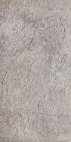 a close up view of a gray marble surface