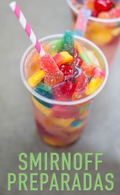 a cup with gummy bears in it and the words smirnoff preparadas