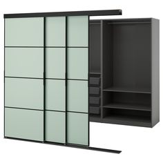 an open sliding door with shelves and drawers on the bottom right hand side is shown