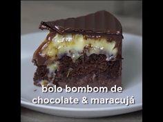 a piece of chocolate cake on a plate with the words bolo bombom de chocolate e maracuja