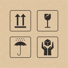 four square signs with different symbols in black and white on brown paper, each containing an umbrella