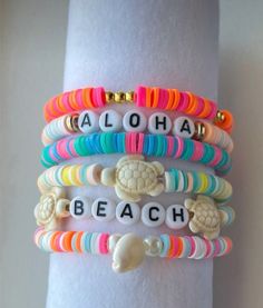 Preppy hawwai beach bracelet’s 🌸💕 Saratoga Springs Utah, Seed Bead Bracelets Diy, Make Clay Beads, Clay Bead Bracelets, Christmas Jewelry Diy, Colorful Bead Bracelets, Clay Bead Necklace, Preppy Bracelets, Homemade Bracelets