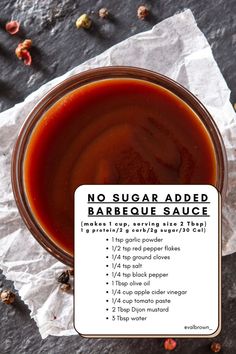 a jar of barbecue sauce sitting on top of a piece of wax paper with instructions