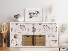 an animal themed cabinet with baskets on top