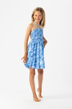 Giving a mini twist to our new Hoku Mini Dress, the Kids Hoku Dress is Summer staple for family vacations, exotic getaways, and all the kid’s stuff in between. Featuring a self tie halter with tassel accents and a smocked bodice, your Mini will love how fun it is to match with Mom. Details: 100% Rayon Hand Wash & Lay flat to dry Features: Unlined, Smocked bodice, Halter tie with tassel accent, Smocked elastic panel on back, Ruffle detail on skirt Sizing: XS (2-4) S/M (4-6), M/L (6-8), XL (8-10), XXL (10-12) Can fit other age groups depending on height- feel free to reach out with any sizing questions. Lottie La Bouff, Kid Dresses, Kids Summer Dresses, Preteen Fashion, Dress For Kids, Jumpsuit For Kids, Mini Twists, Preppy Dresses, With Mom