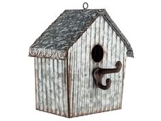 a birdhouse with an iron hook on it's side and a metal roof