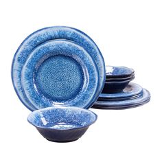 blue dishes are stacked on top of each other