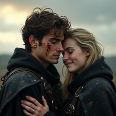 a man and woman with blood on their foreheads are standing close to each other