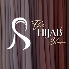 the logo for the shaba store is shown in front of curtained walls and windows