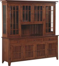 a wooden china cabinet with glass doors and drawers on the top, in front of a white background