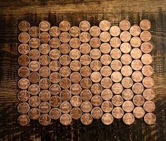 several penny pieces arranged on top of each other in the shape of an american flag