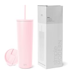 a pink tumbler cup next to a box with a straw in it and the lid open