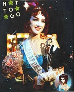 a woman in a blue dress is holding flowers and a tiara with stars on it