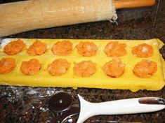 the dough is ready to be made into appetizers with carrots on top