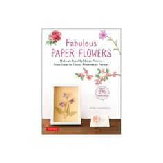 the cover of fabulous paper flowers book on a table with an image of pink flowers