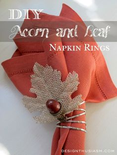 an orange napkin with a maple leaf on it and the words diy acorn and leaf napkin rings