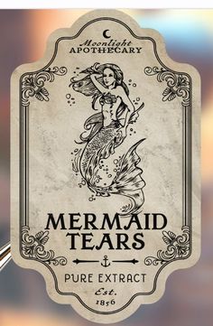 the mermaid tears label is shown on a glass surface with an image of a woman holding a