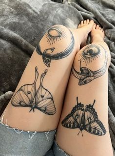 a woman's legs with tattoos on them