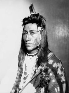 an old photo of a native american man