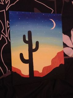 an acrylic painting of a cactus and the moon in the sky above it