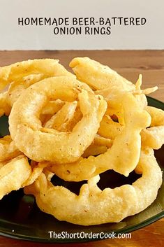 homemade beer - battered onion rings on a green plate