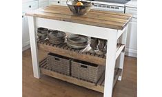 a kitchen island with plates and bowls on it