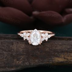 Pear shaped moissanite engagement ring Rose gold butterfly engagement ring Vintage marquise diamond cluster ring Art deco bridal gift ● Ring information: --main stone: moissanite --stone size & shaped: 6*8mm & pear cut --side stones: moissanite/diamond   0.25ct ● Optional service: --personalized order --rush order & overnight --installment --engraving --gift box Please consult us for details ● Production and shipping time: We usually make the ring and arrange the delivery within 7 days, the logi Pear Shaped Cluster Engagement Ring, Moissanite Ring Pear, Engagement Ring Butterfly, Pear Engagement Ring Diamond, Marquise Rings Engagement, Pear Pave Ring, Engagement Rings Butterfly, Engagement Pear Rings, Moissanite Engagement Ring Pear