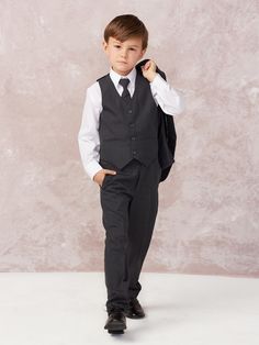 Gorgeous boys suit from Tip Top Kids perfect for every special occasion. Single breasted solid color suit set is made of 5 pieces: 2 button jacket, vest, shirt, tie and pants. It comes in dark gray color for a look that is both polished and distinctive. This special occasion suit in dark gray is a flattering style for your boy. ****PLEASE ALLOW AN ADDITIONAL 5 BUSINESS DAY PROCESSING TIME PRIOR TO SHIPMENT FOR THIS ITEM**** Stylish Children, Dark Gray Suit, Slim Fit Tuxedo, Photography Pics, Slim Suit, Vest And Tie, Slim Fit Jackets, White Long Sleeve Shirt, Ink Blue