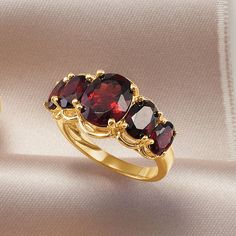 Ross-Simons - 4.50ct t. w. Garnet Five-Stone Ring in 18kt Gold Over Sterling. Size 9. Our ring presents a glimmering quintet of burgundy gemstones. 18kt yellow gold over sterling silver settings drape around 4.50 ct. t. w. oval garnets. January birthday? Make this the ring to commemorate it! 1/2" wide. Garnet ring. Garnet birthstones are the perfect gift for January birthdays. Classic Three Stone Round Ruby Ring, Elegant Three Stone Ruby Ring, Classic Three-stone Ruby Ring For Formal Occasions, Classic Three Stone Ruby Ring For Formal Occasions, Formal Three Stone Ruby Ring, Round Garnet Ring, Garnet Birthstone, Ruby Rings, Pretty Jewelry Necklaces