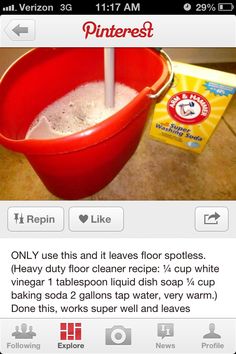 a red bucket filled with white stuff sitting on top of a counter