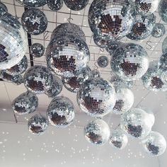 shiny disco balls hanging from the ceiling