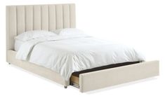 a bed with white sheets and pillows on it's headboard, in front of a white background