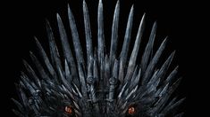 the iron throne from game of thrones is shown in this image with red eyes