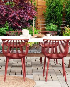 the table and chairs are all painted red