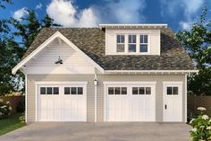 a two car garage with three windows on the top floor