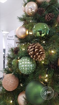 a christmas tree decorated with ornaments and lights