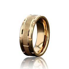 a gold wedding ring with an intricate design on the outside and inside, set in 18k yellow gold