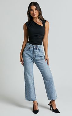 Get ready to rock the denim game in our Wilkins Jeans! With their high-waisted design, straight leg fit, and cropped hem, these jeans are the perfect blend of trendy and timeless. Made from a soft cotton blend with just the right amount of stretch, they offer ultimate comfort without compromising on style. The mid-blue wash adds a cool casual vibe that's perfect for any occasion. Whether you dress them up or down, these jeans will effortlessly take you from day to night in true fashion-forward s Jeans And Bodysuit Outfits, Jeans And Bodysuit, Body Suit Outfits, Hem Jeans, Denim Fabric, High Jeans, Night In, Wide Leg Jeans, Jeans Style