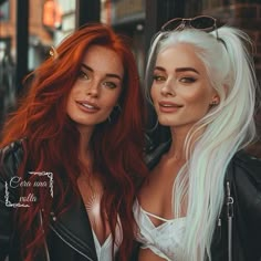 two beautiful women standing next to each other