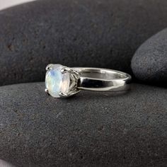 Moonstone is such a stunning stone, and this particular one is no exception. It's a bright, brilliant, 8mm clear to frosty gemstone with bright flashes of blue and rainbow hues, which is set into an airy art deco setting. The ring is custom-sized to you and I'd be happy to source another gemstone if I don't have it listed here (just send me a note!). Please contact me for larger, smaller, quarter sizes, or alternate stones. All of those options are welcome. Moonstone is June's birthstone (one of Solid Gold Bangle, Simple Band, Knuckle Rings, Herkimer Diamond, Moonstone Ring, June Birth Stone, Minimalist Necklace, Gold Bangles, Be Happy