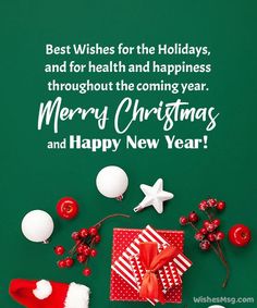 merry christmas and happy new year greeting card with santa's hat on green background