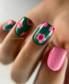 This adorable short nails flowers design is perfect for a whimsical summer look. The pink and green color combination is both playful and elegant, making it ideal for any summer occasion.   Photo credit by: @fahimamolaee_academy Pink And Green Gel Nails, Green And Pink Gel Nails, Nails Flowers Simple, Summer Manicure Ideas Gel, Flowers Short Nails, Manicure Ideas Pink, Short Nails Flowers, Green And Pink Nails Designs, Hot Pink Short Nails